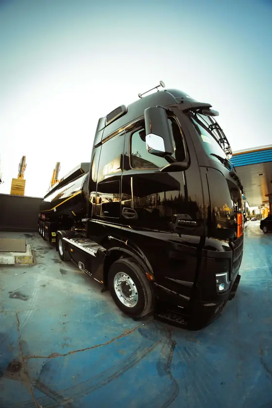 A truck being washed down on the lot